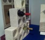  WineMOD Design:Sistema Modulare in travertino anticato per portabottiglie ed angoli bar